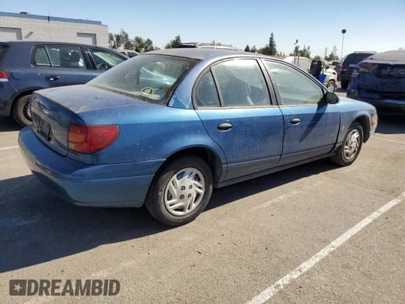 2001 Saturn SL with VIN 1G8ZF52861Z275529, listed as a Copart auction lot 74153154 with 171,272 mi miles and Clean title. Bid and sale history available at DreamBid. Image 3.