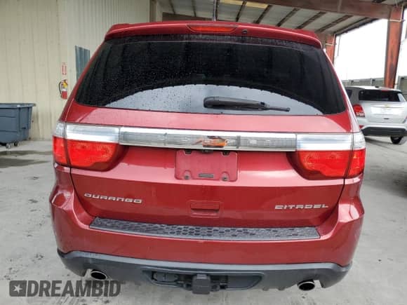 2013 Dodge Durango Citadel z VIN 1C4SDHET0DC667833, wystawiony jako Copart lot #71525725 z przebiegiem 171 478 mil mil oraz Czysty tytuł • Clean title. Historia ofert i sprzedaży dostępna na DreamBid. Obrazek 6.