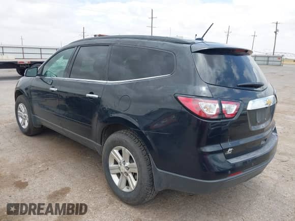 2014 Chevrolet Traverse LT z VIN 1GNKRHKD1EJ318053, wystawiony jako IAAI lot #42562508 z przebiegiem 93 544 mil mil oraz . Historia ofert i sprzedaży dostępna na DreamBid. Obrazek 3.