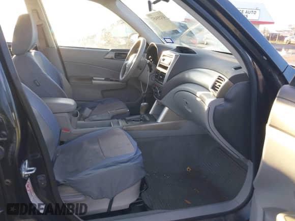 2009 Subaru Forester X with VIN JF2SH61639H704040, listed as a IAAI auction lot 43255457 with 180,871 mi miles and . Bid and sale history available at DreamBid. Image 5.