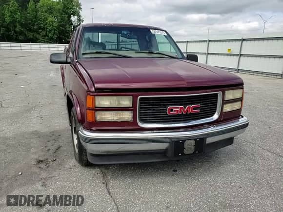 1997 GMC Sierra 1500 z VIN 1GTEC19R6VE549846, wystawiony jako Copart lot #58595575 z przebiegiem 209 913 mil mil oraz Szkoda całkowita • Salvage title. Historia ofert i sprzedaży dostępna na DreamBid. Obrazek 13.