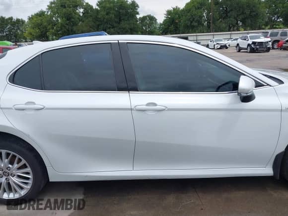 2020 Toyota Camry Hybrid XLE with VIN 4T1F31AK6LU540730, listed as a IAAI auction lot 42368941 with 91,035 mi miles and . Bid and sale history available at DreamBid. Image 13.