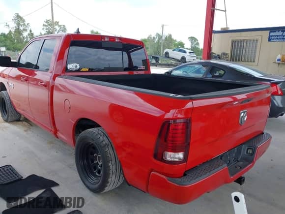 2014 Ram 1500 Sport with VIN 1C6RR6HT8ES154232, listed as a IAAI auction lot 42051723 with 122,982 mi miles and . Bid and sale history available at DreamBid. Image 3.