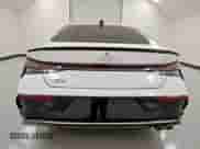 2025 Hyundai Elantra N Line z VIN KMHLR4DF0SU933767, wystawiony jako Copart lot #67764285 z przebiegiem 20 976 mil mil oraz Czysty tytuł • Clean title. Historia ofert i sprzedaży dostępna na DreamBid. Obrazek 6.