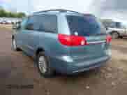 2008 Toyota Sienna XLE z VIN 5TDBK22C28S014660, wystawiony jako IAAI lot #43568791 z przebiegiem 234 423 mil mil oraz . Historia ofert i sprzedaży dostępna na DreamBid. Obrazek 3.