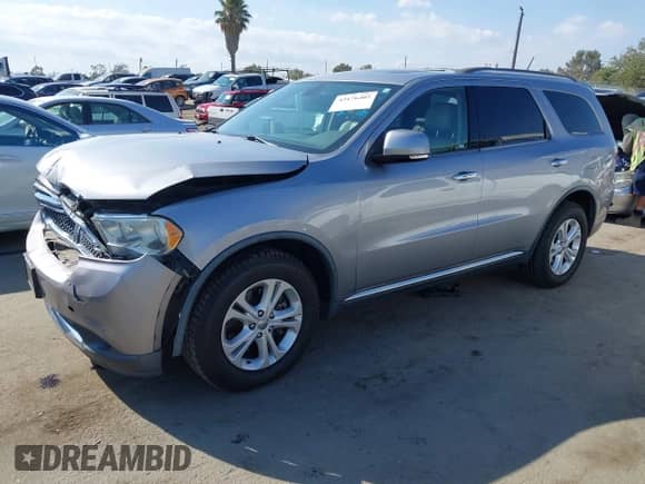 2013 Dodge Durango Crew z VIN 1C4SDHDT8DC687443, wystawiony jako IAAI lot #43176405 z przebiegiem 125 453 mil mil oraz . Historia ofert i sprzedaży dostępna na DreamBid. Obrazek 2.