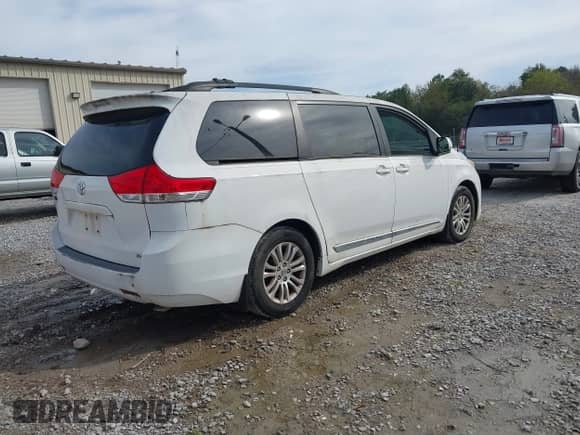2012 Toyota Sienna XLE with VIN 5TDYK3DC4CS231407, listed as a IAAI auction lot 43531271 with 382,802 mi miles and . Bid and sale history available at DreamBid. Image 4.