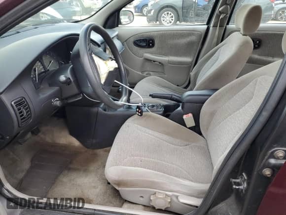 2001 Saturn SL with VIN 1G8ZK54761Z320887, listed as a Copart auction lot 54170885 with 99,265 mi miles and Salvage title. Bid and sale history available at DreamBid. Image 7.