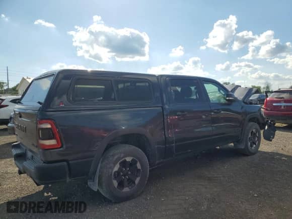 2019 Ram 1500 Rebel z VIN 1C6SRFLT0KN715641, wystawiony jako Copart lot #69248995 z przebiegiem Nie podano mil oraz Szkoda całkowita • Salvage title. Historia ofert i sprzedaży dostępna na DreamBid. Obrazek 3.