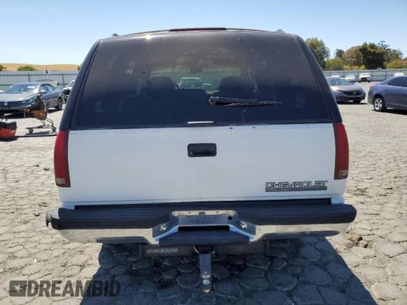 1995 Chevrolet Tahoe z VIN 1GNEK13K2SJ418115, wystawiony jako Copart lot #69060835 z przebiegiem 80 798 mil mil oraz Szkoda całkowita • Salvage title. Historia ofert i sprzedaży dostępna na DreamBid. Obrazek 6.