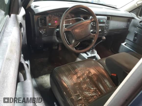 2004 Dodge Dakota Sport z VIN 1D7HG32N54S525290, wystawiony jako Copart lot #77141804 z przebiegiem 217 012 mil mil oraz Szkoda całkowita • Salvage title. Historia ofert i sprzedaży dostępna na DreamBid. Obrazek 8.