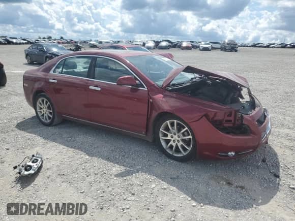 2008 Chevrolet Malibu LTZ with VIN 1G1ZK57728F255493, listed as a Copart auction lot 68514685 with 128,440 mi miles and Salvage title. Bid and sale history available at DreamBid. Image 4.