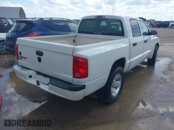 2006 Dodge Dakota SLT with VIN 1D7HE48K66S556852, listed as a IAAI auction lot 42499533 with 204,503 mi miles and . Bid and sale history available at DreamBid. Image 4.