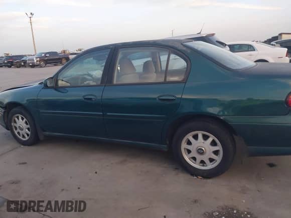 1999 Chevrolet Malibu LS с VIN 1G1NE52M3X6230247, выставлен на аукционе IAAI как лот 41712060 с пробегом 189 881 миль миль и . История ставок и продаж доступна на DreamBid. Изображение 14.