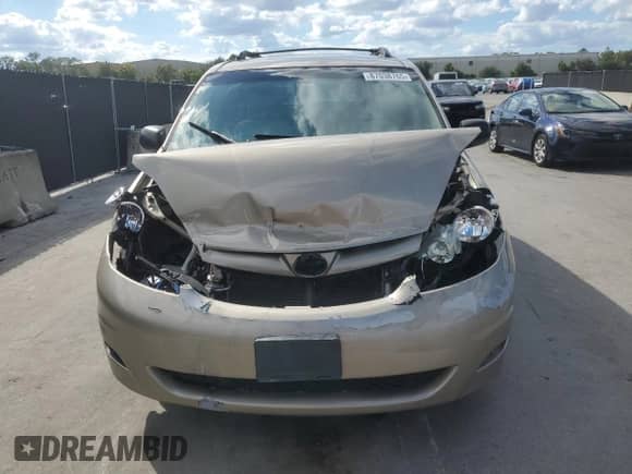 2010 Toyota Sienna CE z VIN 5TDKK4CC5AS336015, wystawiony jako Copart lot #87038765 z przebiegiem 241 385 mil mil oraz Szkoda całkowita • Salvage title. Historia ofert i sprzedaży dostępna na DreamBid. Obrazek 5.