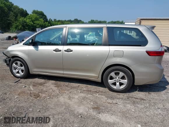 2015 Toyota Sienna L with VIN 5TDZK3DC4FS650415, listed as a IAAI auction lot 42395118 with 486,330 mi miles and . Bid and sale history available at DreamBid. Image 15.