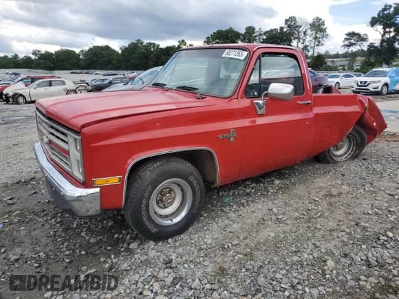 1986 Chevrolet Silverado 1500 с VIN 1GCDC14H1GF410960, выставлен на аукционе Copart как лот 68271265 с пробегом 5 940 миль миль и На запчасти • Non repairable. История ставок и продаж доступна на DreamBid. Изображение 1.
