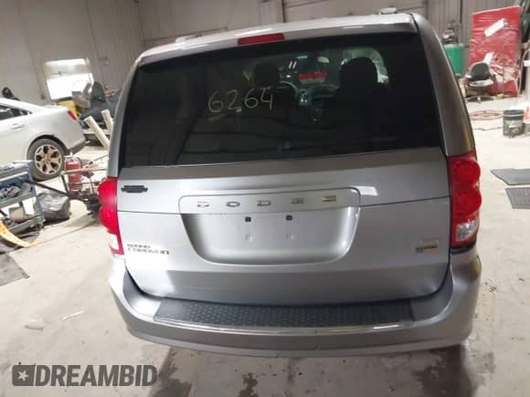 2014 Dodge Grand Caravan SXT with VIN 2C4RDGCGXER263963, listed as a IAAI auction lot 41956264 with 138,815 mi miles and . Bid and sale history available at DreamBid. Image 16.
