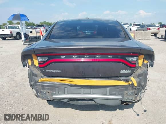 2015 Dodge Charger SE with VIN 2C3CDXBGXFH735601, listed as a IAAI auction lot 43106037 with 116,702 mi miles and . Bid and sale history available at DreamBid. Image 16.