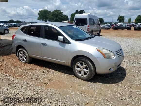 2010 Nissan Rogue S with VIN JN8AS5MV2AW131841, listed as a Copart auction lot 58918055 with 164,324 mi miles and Salvage title. Bid and sale history available at DreamBid. Image 4.