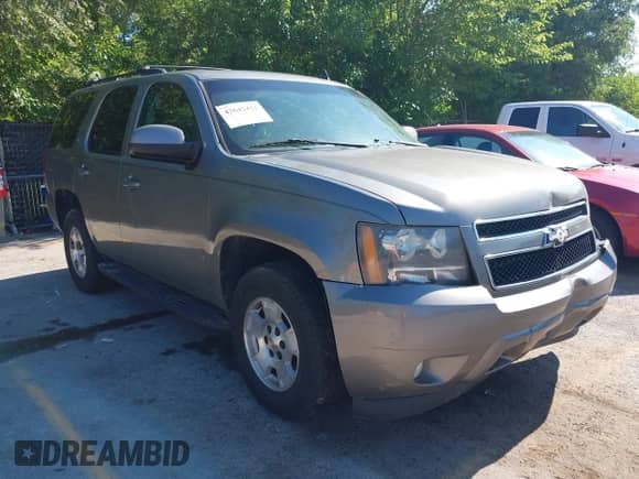 2009 Chevrolet Tahoe 2LT with VIN 1GNFK23009R103544, listed as a IAAI auction lot 42642422 with 300,378 mi miles and . Bid and sale history available at DreamBid. Image 1.