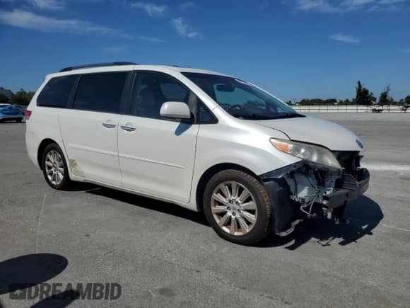 2012 Toyota Sienna XLE AAS with VIN 5TDYK3DC8CS190893, listed as a Copart auction lot 89573505 with 145,575 mi miles and Salvage title. Bid and sale history available at DreamBid. Image 4.