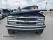 1999 Chevrolet Tahoe с VIN 3GNEK18R0XG106650, выставлен на аукционе Copart как лот 63455944 с пробегом 158 146 миль миль и На запчасти • Non repairable. История ставок и продаж доступна на DreamBid. Изображение 5.
