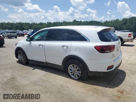 2020 Kia Sorento LX with VIN 5XYPG4A33LG651034, listed as a Copart auction lot 64613505 with 56,871 mi miles and Salvage title. Bid and sale history available at DreamBid. Image 2.