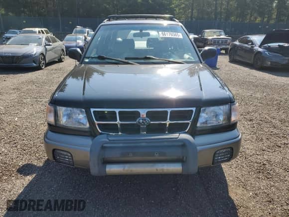 1998 Subaru Forester S with VIN JF1SF6553WH756100, listed as a Copart auction lot 66176565 with Not provided miles and Salvage title. Bid and sale history available at DreamBid. Image 5.