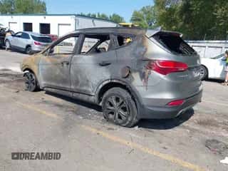 2014 Hyundai Santa Fe with VIN 5XYZUDLBXEG185949, listed as a IAAI auction lot 43249188 with Not provided miles and . Bid and sale history available at DreamBid. Image 3.