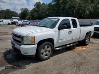 2010 Chevrolet Silverado 1500 LT with VIN 1GCSCSE05AZ208473, listed as a Copart auction lot 65692505 with 255,036 mi miles and Salvage title. Bid and sale history available at DreamBid. Image 1.
