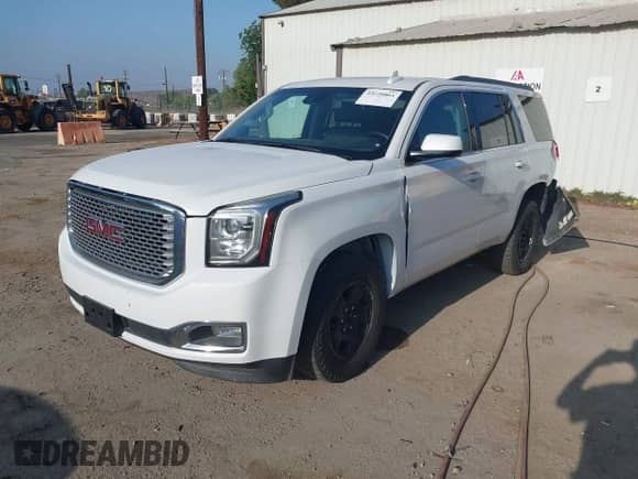 2018 Chevrolet Tahoe LT z VIN 1GNSKBKC7JR351112, wystawiony jako IAAI lot #43220861 z przebiegiem 103 862 mil mil oraz . Historia ofert i sprzedaży dostępna na DreamBid. Obrazek 19.