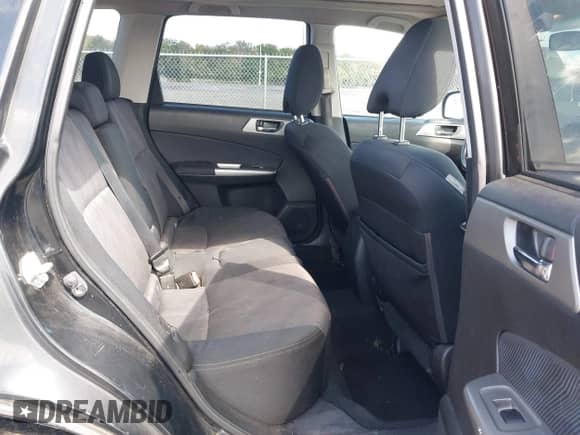 2009 Subaru Forester X with VIN JF2SH63689H734681, listed as a IAAI auction lot 43310176 with 296,187 mi miles and . Bid and sale history available at DreamBid. Image 8.