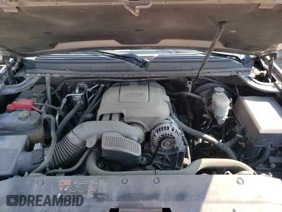 2013 Chevrolet Tahoe LS with VIN 1GNSKAE01DR202100, listed as a Copart auction lot 57896221 with 107,509 mi miles and Salvage title. Bid and sale history available at DreamBid. Image 7.