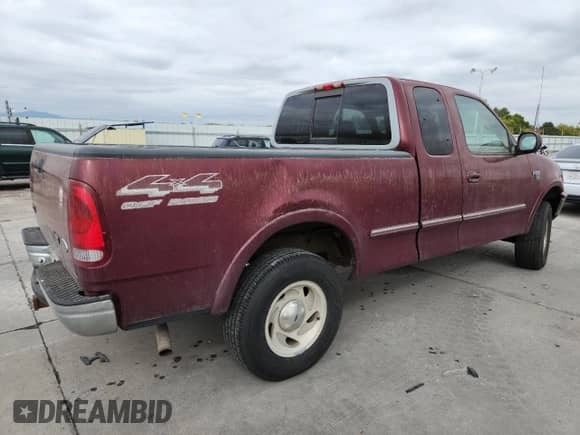 1998 Ford F-150 XL с VIN 1FTEX18L4WKA03275, выставлен на аукционе Copart как лот 84770115 с пробегом 173 880 миль миль и Чистый • Clean title. История ставок и продаж доступна на DreamBid. Изображение 3.