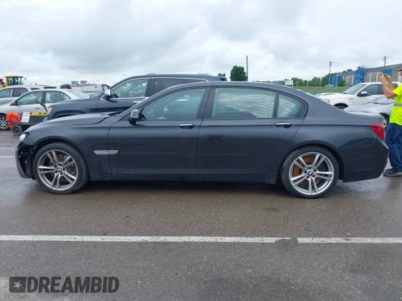 2013 BMW 7 Series 750Li with VIN WBAYE8C5XDD132883, listed as a IAAI auction lot 42470274 with 96,047 mi miles and . Bid and sale history available at DreamBid. Image 14.