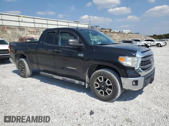 2014 Toyota Tundra SR5 с VIN 5TFUY5F12EX405170, выставлен на аукционе Copart как лот 80782245 с пробегом 111 860 миль миль и Списание • Salvage title. История ставок и продаж доступна на DreamBid. Изображение 4.