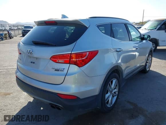 2015 Hyundai Santa Fe with VIN 5XYZWDLA8FG255743, listed as a IAAI auction lot 42014071 with 168,897 mi miles and . Bid and sale history available at DreamBid. Image 4.