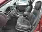 2016 Chevrolet Traverse LT z VIN 1GNKVHKD0GJ114083, wystawiony jako Copart lot #81796605 z przebiegiem 82 705 mil mil oraz Czysty tytuł • Clean title. Historia ofert i sprzedaży dostępna na DreamBid. Obrazek 7.