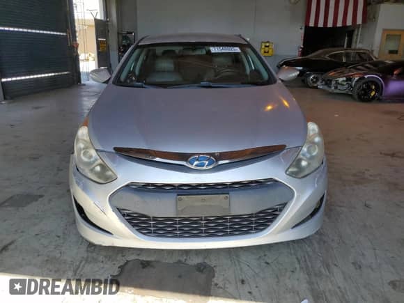 2012 Hyundai Sonata Hybrid z VIN KMHEC4A45CA021412, wystawiony jako Copart lot #71548025 z przebiegiem 160 511 mil mil oraz Czysty tytuł • Clean title. Historia ofert i sprzedaży dostępna na DreamBid. Obrazek 5.