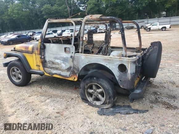 2000 Jeep Wrangler SE with VIN 1J4FA29P9YP787126, listed as a Copart auction lot 69889405 with Not provided miles and Non repairable. Bid and sale history available at DreamBid. Image 2.