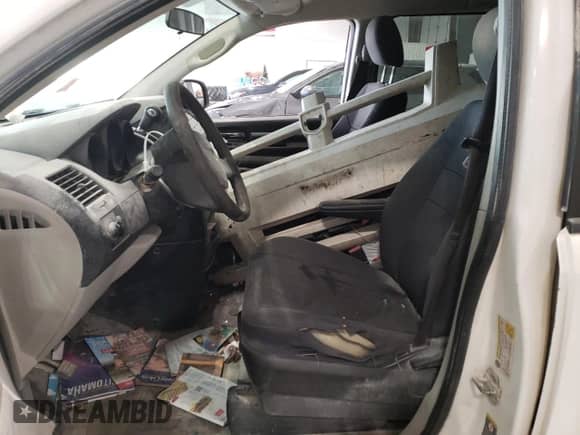 2010 Dodge Grand Caravan Cargo with VIN 2D4CN1AE5AR265778, listed as a Copart auction lot 85773554 with Not provided miles and Salvage title. Bid and sale history available at DreamBid. Image 7.