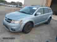 2013 Dodge Journey SXT with VIN 3C4PDCBB5DT556817, listed as a IAAI auction lot 43388905 with 205,825 mi miles and . Bid and sale history available at DreamBid. Image 2.