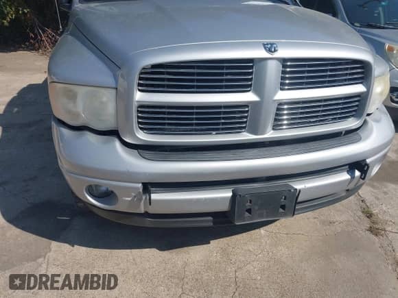 2004 Dodge 1500 SLT with VIN 1D7HU18D44S767841, listed as a IAAI auction lot 43140803 with 267,489 mi miles and . Bid and sale history available at DreamBid. Image 6.