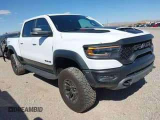 2021 Ram 1500 TRX z VIN 1C6SRFU95MN736992, wystawiony jako IAAI lot #42384505 z przebiegiem 34 133 mil mil oraz . Historia ofert i sprzedaży dostępna na DreamBid. Obrazek 1.