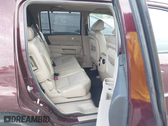 2009 Honda Pilot Touring with VIN 5FNYF38819B022195, listed as a IAAI auction lot 42850497 with 192,072 mi miles and . Bid and sale history available at DreamBid. Image 8.