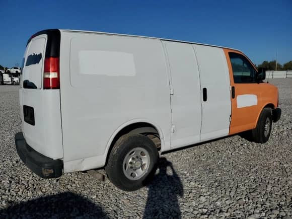 2013 Chevrolet Express Cargo with VIN 1GCWGFBA9D1180058, listed as a Copart auction lot 63494745 with 163,668 mi miles and Salvage title. Bid and sale history available at DreamBid. Image 3.