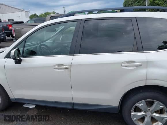 2014 Subaru Forester Touring z VIN JF2SJAPC7EH536627, wystawiony jako IAAI lot #42862912 z przebiegiem 114 727 mil mil oraz . Historia ofert i sprzedaży dostępna na DreamBid. Obrazek 14.