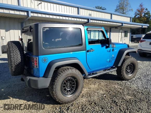 2016 Jeep Wrangler Sport with VIN 1C4AJWAG3GL223528, listed as a Copart auction lot 82407265 with 78,219 mi miles and Salvage title. Bid and sale history available at DreamBid. Image 3.