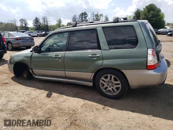 2008 Subaru Forester X L.L. Bean с VIN JF1SG67698H704623, выставлен на аукционе Copart как лот 55327575 с пробегом 187 256 миль миль и Списание • Salvage title. История ставок и продаж доступна на DreamBid. Изображение 2.